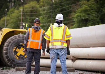 V. Vand Dyke yard workers preparing to assist heavy lift operation